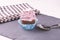 Cupcake, spoon on slate base