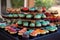 cupcake stand with colorful assortment of cupcakes