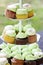 A cupcake tower at a party in the afternoon