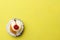 Cupcake on yellow background. minimal food concept