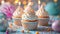 Cupcakes, candles, and vibrant decorations compose a delightful birthday setting