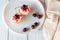 Cupcakes with cherries on plate