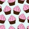 Cupcakes with chocolate sprinkles isolated on blue background. Sweet Dessert with pink berry cream. Strawberry taste