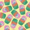 Cupcakes with colorful cream, rainbow sprinkles and donut seamless pattern.