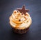 Cupcakes with cream cheese, caramel and chocolate