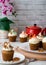 Cupcakes Garnished With Cheese Cream.