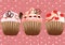 Cupcakes on the pink background