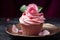 Cupcakes with pink frosting and rose on top