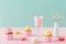 cupcakes and sweet macarons and glass of milkshake on pastel