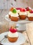 Cupcakes with vanilla buttercream and marzipan fruits