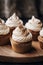 Cupcakes with vanilla and coffee-caramel frosting, modern food blog aesthetic