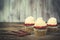 Cupcakes with whipped vanila cream, on wooden table. Picture for a menu or a confectionery catalog. Copy space. Sweet cupcakes for