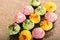 Cupcakes. yellow, green and pink cakes.