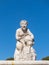 Cupid statue in the fountain of the Garden of Roses in Buen Retiro Park. Madrid