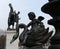 Cupid on a swan, bronze statue decoration of old street lamp near Austrian Parliament Building, Vienna, Austria. It was erected in