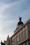 Cupola of the building at Gran VÃ­a 69 in the center of Madrid crowned by Ganymede and the Phoenix bird