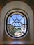 Cupola of monastery seen through the vintage window