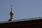 The cupola with an Orthodox cross chapel Christian Church visible over the roof of one of the inner buildings of the fortress.