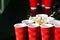 Cups for beer pong game on table