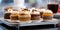 Cups of coffee and cupcakes on a coffee tray, concept of Food presentation