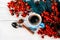 Cups of fragrant coffee on a Christmas background