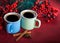 Cups of fragrant coffee on a Christmas background