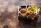 Cups Herbal tea and Healing herbs in a wooden tray