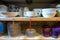 Cups, plates and bowls on shelves