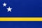 Curacao national fabric flag, textile background. American state official sign