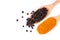 Curcumin powder  tumeric ground, turmeric, Curcuma  and black pepper corn in wooden spoon isolated on white