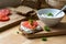 curd cheese dip with herbs and rustic wholegrain bread with tomatoes