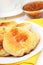 Curd pancakes with yellow raspberry confiture