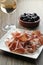 Cured iberian ham and olives tapas