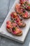 Cured salmon gravlax on a crusty bread