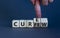 Curfew and cure symbol. Businessman turns cubes and changes the word `curfew` to `cure`. Beautiful grey background. Business,