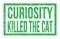CURIOSITY KILLED THE CAT, words on green rectangle stamp sign