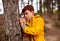 Curious boy with magnifier in forest