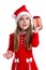 Curious christmas girl holding a gift box it in the hand, wearing a santa hat, white background