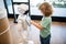 curious kid interact with robot artificial intelligence, communication