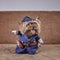 Curious yorkshire terrier in costume of policeman looks to side