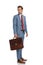 Curious young businessman with suitcase looking over shoulder