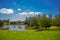 CURITIBA ,BRAZIL - MAY 12, 2016: nice skyline view of the city from the botanical park, small lake inside the park