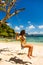 Curly girl on a swing at the beach near Cudugnon Cave, Palawan, Philippines