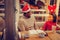 Curly girl wearing nice Christmas accessories looking at father