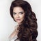 Curly hair woman. Healthy hairstyle. Beauty makeup. Closeup port