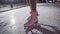 Curly pirouettes. Girl& x27;s legs on ice skate. Figure skating rotation
