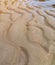 Curly sand waves