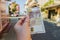 Currency - Bulgarian lev. A woman`s hand holds a 50 denomination bill on the street