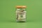 currency dollars in a glass jar. Saving money in a glass jar. Savings and investments, income, wages, cash loans, cash flow