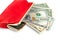Currency paper bills in a red leather wallet, isolate on a white background